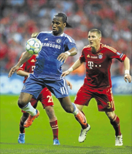 Chelsea's Didier Drogba and Bastian Schweinsteiger of FC Bayern Muenchen during UEFA Champions League Final . Photo: Getty Images