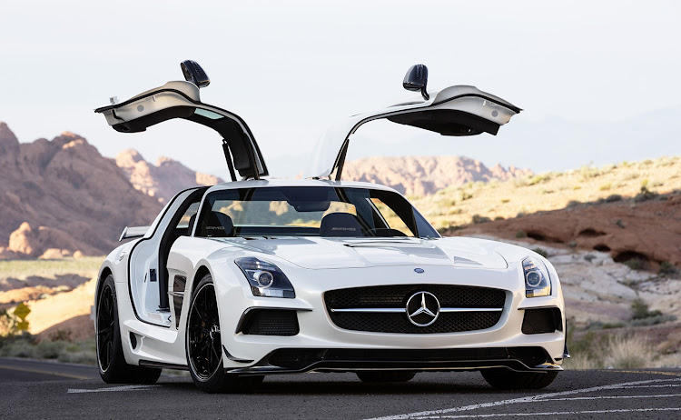 The SLS was the first car developed from the ground up by Mercedes-AMG, and its gullwing doors hide a secret trick.