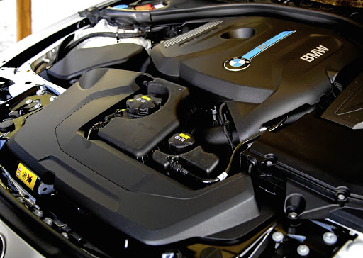 The full BMW hybrid system up front, although the batteries restrict the boot space