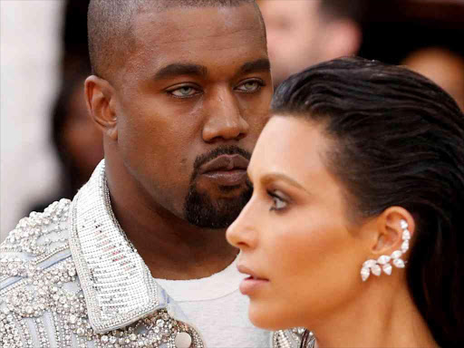 Musician Kanye West and wife Kim Kardashian /REUTERS