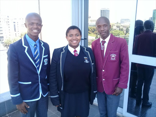 WELL DONE: From left, Phikolomzi Mjikelwa of St James S.S.S. Flagstaff, Mphoenthe Piliso of Cofimvaba S.S.S and Reamohetse Mofitiso of Lehana S.S.S Mount Fletcher are among the top 25 matric pupils of 2017 Picture: SUPPLIED