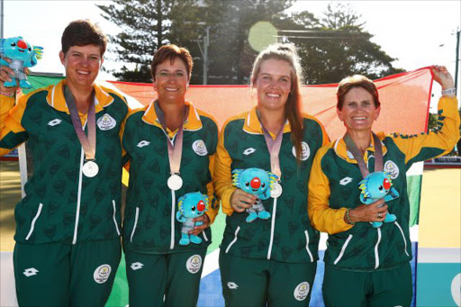 Silver medalists Esme Kruger, Nicolene Neal, Johanna Snyman and Elma Davis of South Africa pose after the victory ceremony for the Women's Fours at the Lawn Bowls on day five of the Gold Coast 2018 Commonwealth Games at Broadbeach Bowls Club on April 9, 2018 on the Gold Coast, Australia. Picture: GETTY IMAGES