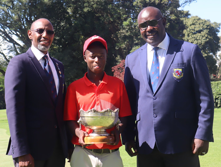 Kenya Golf Union vice chairman David Ndung'u, Elvis Muigua and KGU chairman Philip Ocholla during the Sigona Bowl at Sigona Golf Club on Sunday