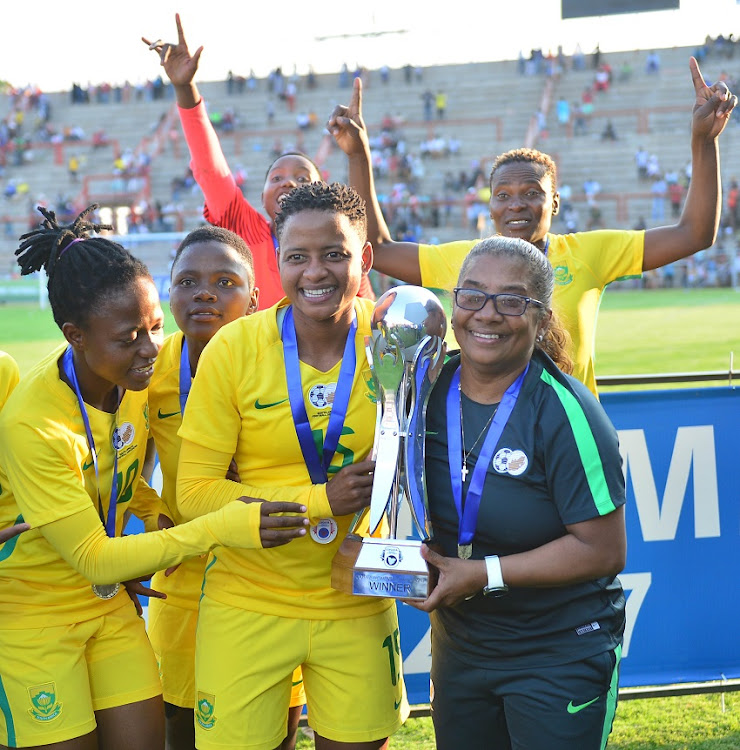 Refiloe Jane and Desiree Ellis, coach of South Africa celebrates winners of the 2017 COSAFA Women's Championship Final football match between South Africa and Zimbabwe at Barbourfields Stadium, Bulawayo on 24 September 2017.