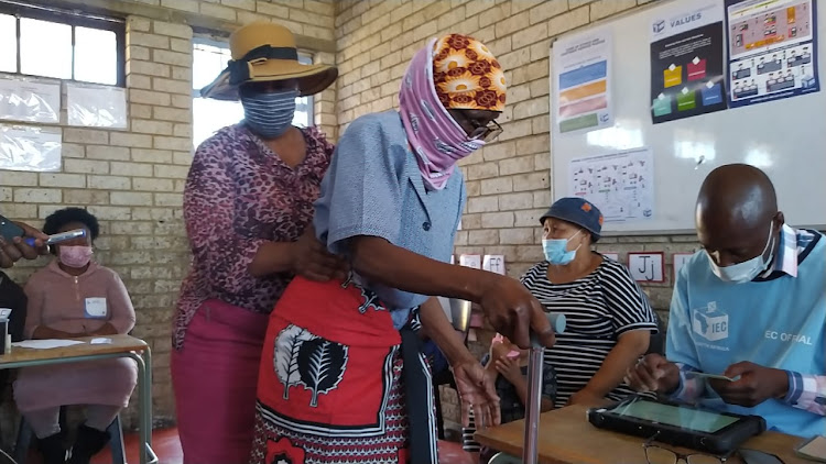 Tsatsawani Anna Majujwa, 93, said she was elated that she could make her voice heard as she cast her ballot in Soweto on Monday. Helping her was her daughter, 60-year-old Johanna Mjujwa.