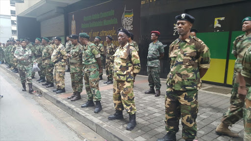 Members of the MK veterans association gather outside Luthuli House.