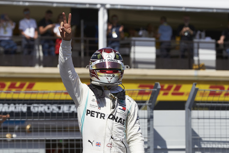 Lewis Hamilton triumphant in France.