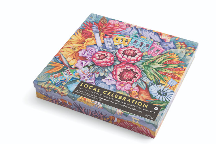 This 'Local Celebration' tin designed by Studio Muti is filled with melktert-inspired biscuits and hand-decorated almond and cardamom biscuits.