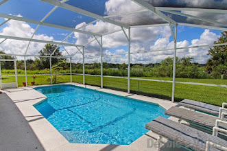 Lake view from the southwest-facing private pool of this Davenport villa