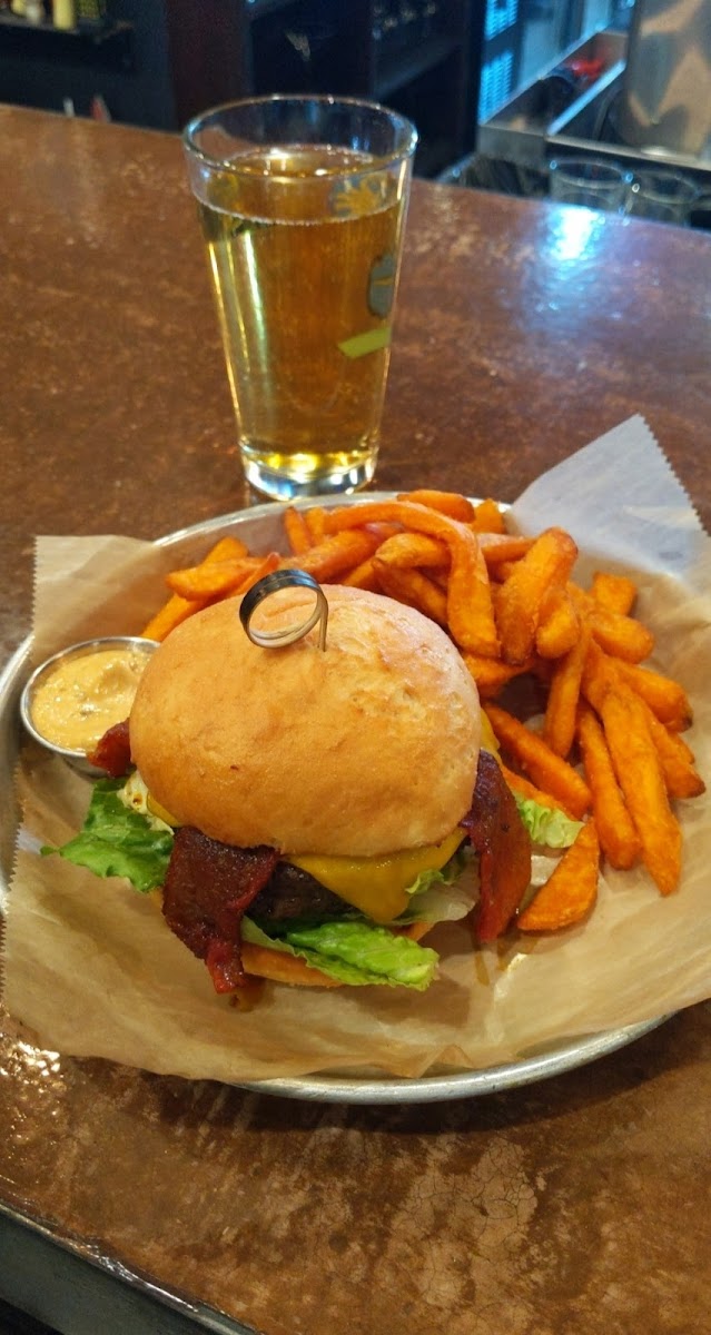 Backyard classic stacker with sweet potato fries and chipotle aioli on gluten free bun