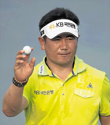 Gonzalo Fernandez-Castano of Spain watches his shot during the third day of the Singapore Open at the Tanjong Course on Sentosa Island yesterday. The Spaniard stormed into a three-shot lead before a tropical downpour in the afternoon forced organisers to abandon play and reduce the event to 54 holes Picture: REUTERS