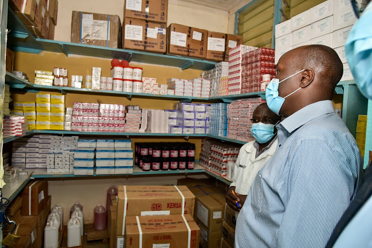 Nakuru Governor Lee Kinyanjui in a pharmacy during a visit at one of the public health facilities in Gilgil Sub-County.