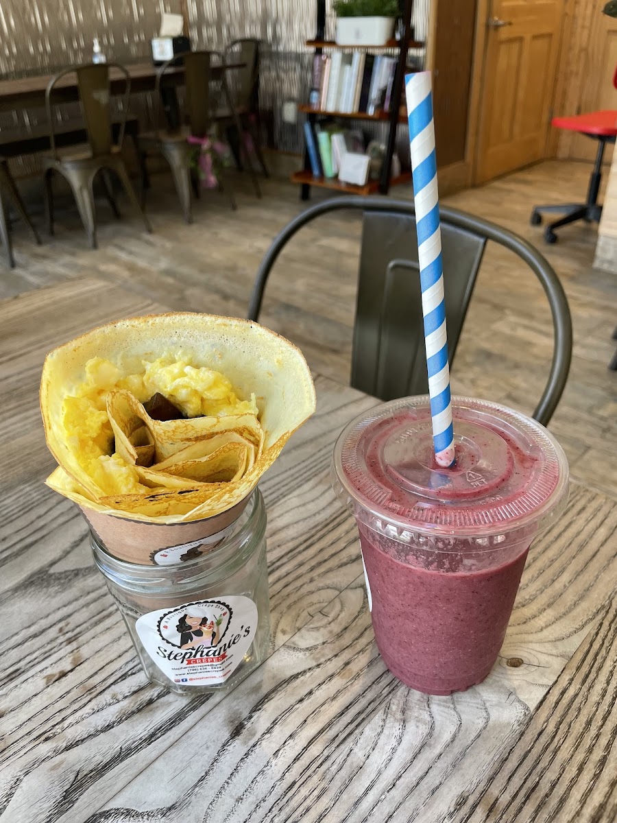 Eggs and truffled mushrooms with mixed berry smoothie