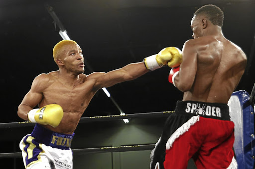 Azinga 'Golden Boy' Fuzile against Tshifhiwa 'Atomic Spider' Munyai.