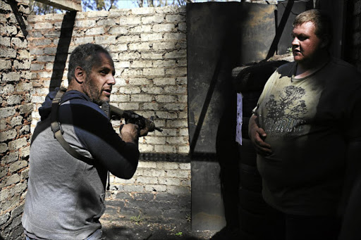 AUGUST 24, 2017. Farmer Gerdus du Plessis, 25, takes instruction from Idan Abolnik. Idan Abolnik, an ex highly trained soldier in the Israeli army, Who now lives in South Africa, instructs farmers and concerned citizens in advanced self defense methods and weapon training. Abolnik believes that he is empowering people through his training techiques. He also trains various law enforcement sectors. SWAT National Firearms Centre, Zwartkops, Centurion. PHOTOGRAPH: ALON SKUY/THE TIMES