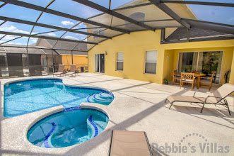 Recharge your batteries on the southeast facing pool deck at this Emerald Island vacation villa