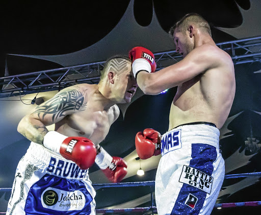 Daniel 'Billy the Kid' Bruwer, left, and Thomas 'Tommy Gun' Oosthuizen. Oosthuizen is ready to get back into the ring.