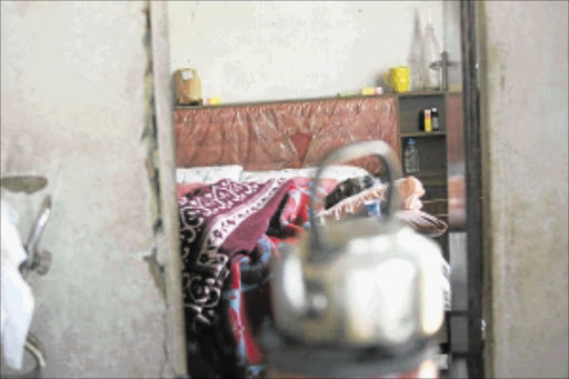 BEDRIDDEN: Clara Kgasoane has never enjoyed the benefits of an electrified house. Her house is one of the two in Munsieville, Mogale City, that were never electrified during the mass electricity roll-out post-1994. PHOTO: BAFANA MAHLANGU