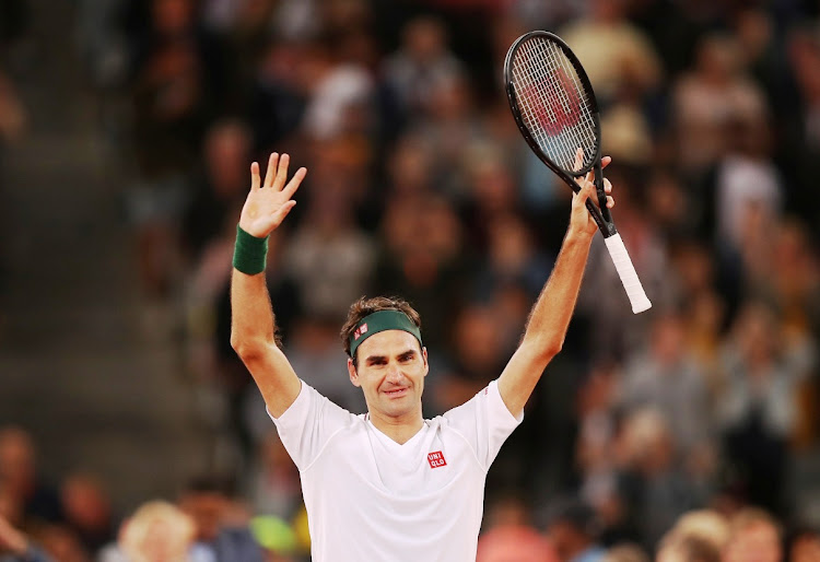Roger Federer celebrates winning the Match in Africa against Rafael Nadal at Cape Town Stadium on February 7 2020.