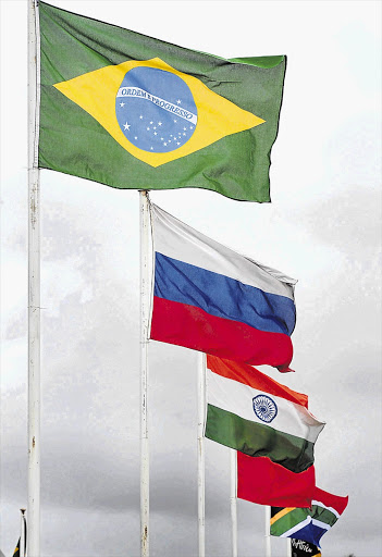 The flags of Brazil, Russia, India, China and South Africa fly in Durban at the Brics Summit
