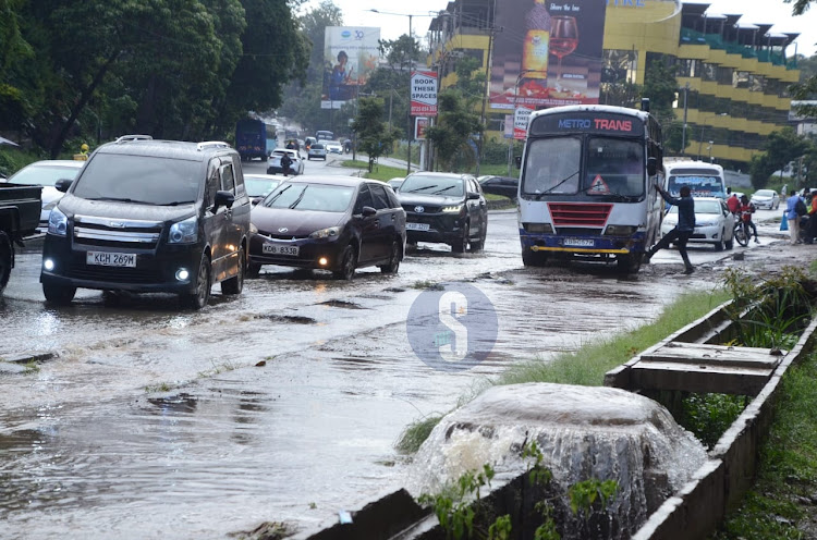 A sewage burst along Kenyatta Avenue Road along the Integrity Center after heavy downpour witnessed in the county, on April 24 2024.