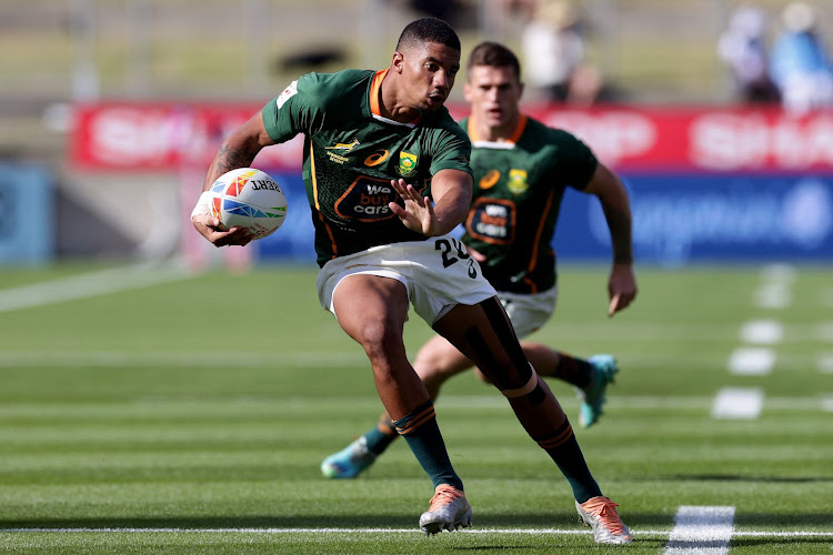 Shilton van Wyk of South Africa runs with the ball during the 2023 HSBC Sevens match between South Africa and Canada at FMG Stadium on January 21, 2023 in Hamilton, New Zealand.