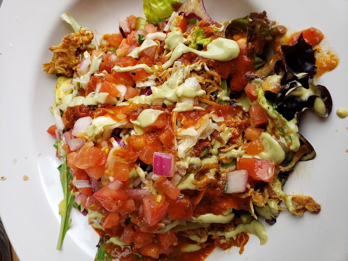 Avocado smash bowl with braised chicken