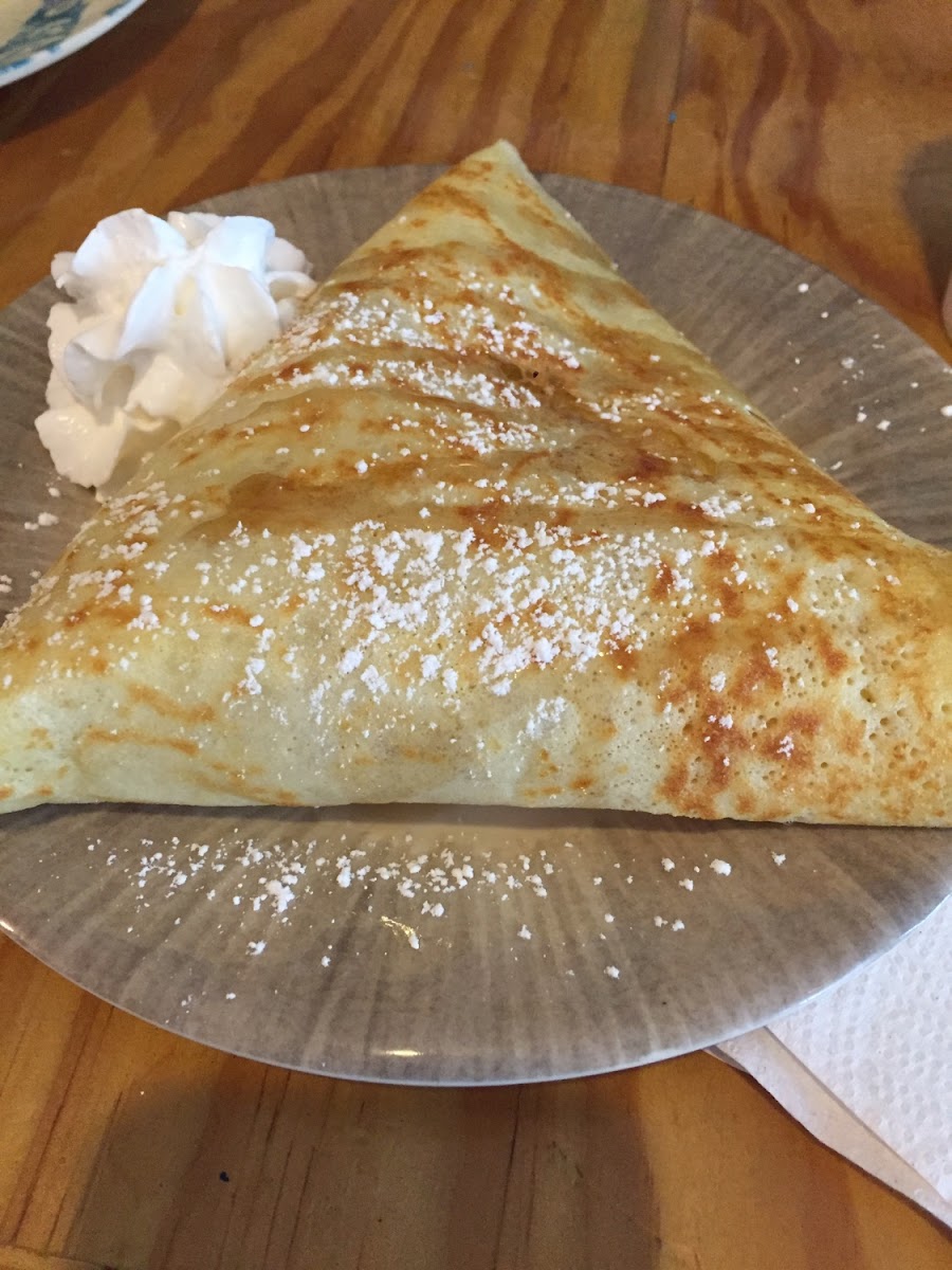 Gluten free crepe with banana, walnut, brown sugar and maple syrup.