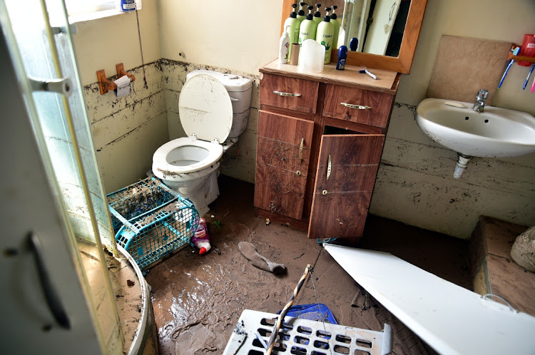 A Kariega family could do nothing but watch as water swept through their home on Saturday night after a main supply line outside their Mimosa Drive home burst