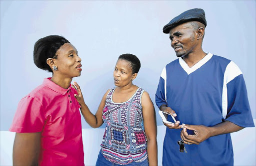 NOT HAPPY: A Kenton-on-Sea teacher Nosipho Dyonase seen here with two other teachers who claim to have had monies deducted from their salaries by insurance company, Assupol, without their consent. Seen with Dyonase are Kwelerha teacher, Nozuko Xulubana, and Elliotdale teacher Matutu Mnukwana Picture: SINO MAJANGAZA