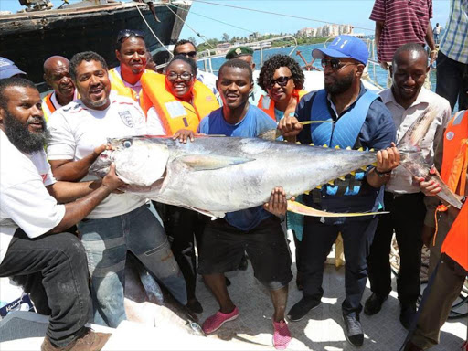 Mombasa Governor Hassan Joho and county government leadership joins other fishermen to celebrate the first big catch of the MV001. PHOTO BY CHARLES MGHENYI