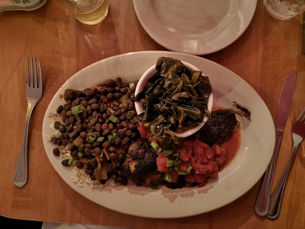 Blackened catfish with rice and beans and collard greens.