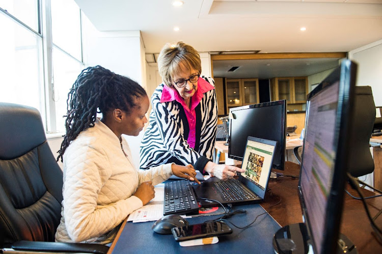 ‘Admit when you don’t know the answer,’ is one of Wolmarans’s philosophies. Here she’s working with Motlatjo Selabe on digital health systems. Picture: Delwyn Verasamy