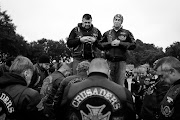 National president of the Crusaders Motorcycle Club SA, Mark Groenewald, and national shepard, Darryl Hall, pray before the club's National Run to Durban. They rode with precision and discipline to the coast.
