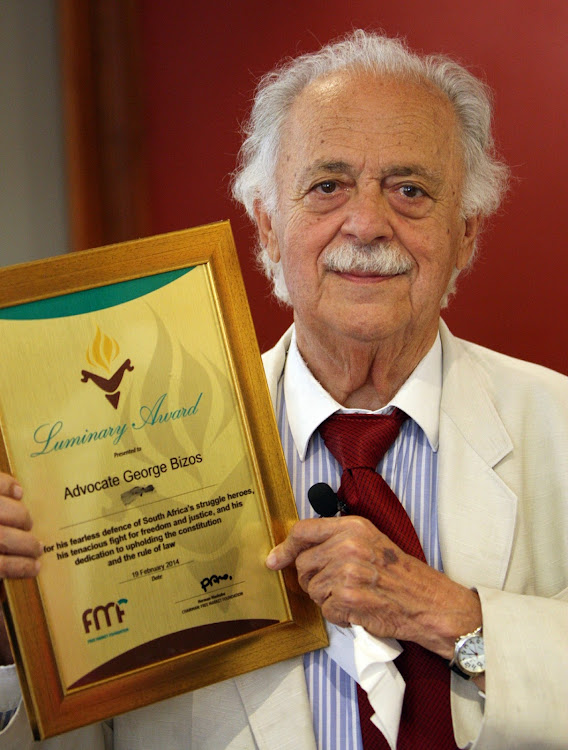 FEBRUARY 19 2014: Advocate George Bizos receives a Luminary Award from the Free Market Foundation on February 19, 2014 in Johannesburg, South Africa. The human rights lawyer received the award for his fearless defense of South Africa's struggle Heroes.