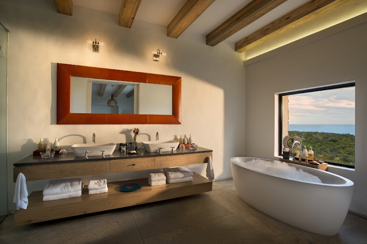 Morukuru Ocean House's bathroom with a view.