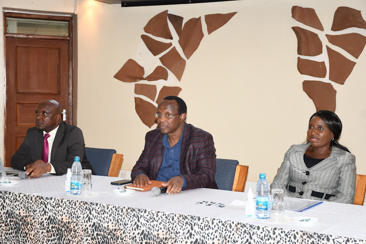 Professor Vincent Machuki, Council of Economic Advisers chairman David Ndii and Higher Education and Research PS Beatrice Inyangala during the universities funding workshop attended by vice chancellors and principals of constituent colleges