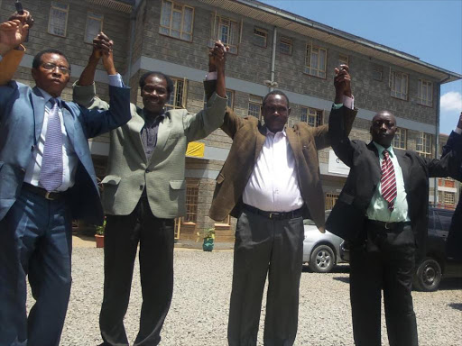 DISPUTED LEADERS: Ford People faction chairman James Kenani (second left) and other officials on Friday outside Shalom House, Nairobi, after the party NEC meeting.