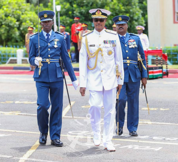 Chief of Defence Forces (CDF) General Charles Kahariri received by military members during a change of guard at the DoD in Nairobi on May 7, 2024.