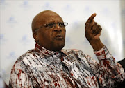 Archbishop Desmond Tutu addresses media representatives after the Dalai Lama announced that he will not travel to South Africa, to attend Archbishop Tutu's 80th birthday party, on October 4, 2011 in Cape Town.