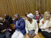 The family of Phumzile Dube, who died after the collision between Duduzane Zuma's Porsche and a minibus taxi, in court for judgment on July 12 2019.