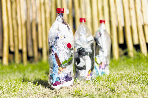 RUBBISH IDEA: Plastic bottles stuffed with non-recylable waste will insulate homes of the future