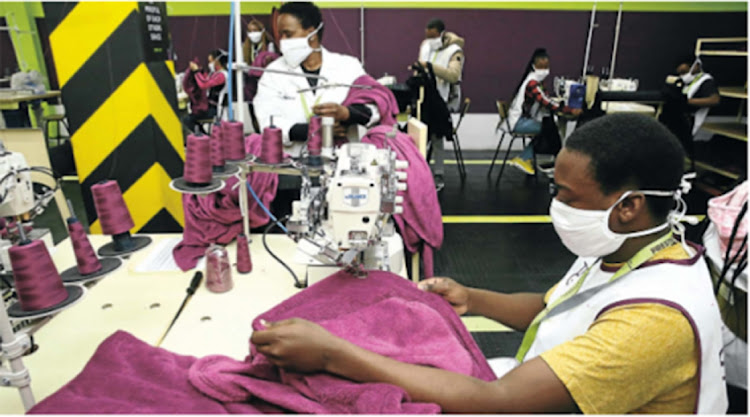 Wisani Shibamby sews a blanket at the TFG Prestige Clothing factory in Johannesburg. Picture: THAPELO MOREBUDI