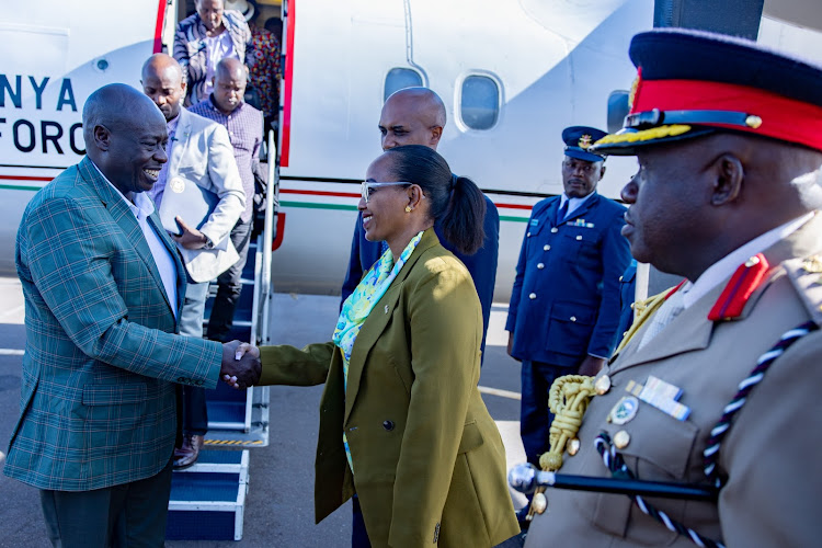 Kenya High Commissioner to Rwanda Ambassador Janet Mwawasi Oben (L) welcoming Deputy President Rigathi Gachagua to Kigali, Rwanda on April 6, 2024.