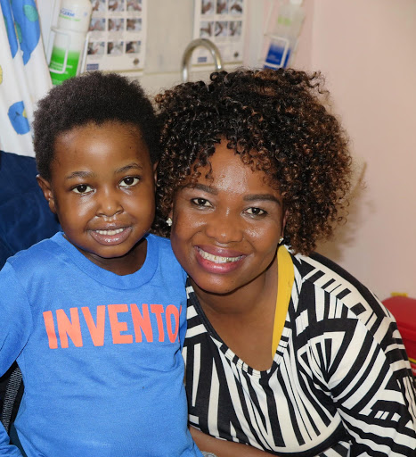 Mnotho Mndebele and his delighted mother, Mbali Mndebele. Mnotho is the youngest patient in Africa, and one of the smallest and youngest in the world, to have had the benefit of a HVAD mechanical heart implant. Picture Credit: Aron Hyman