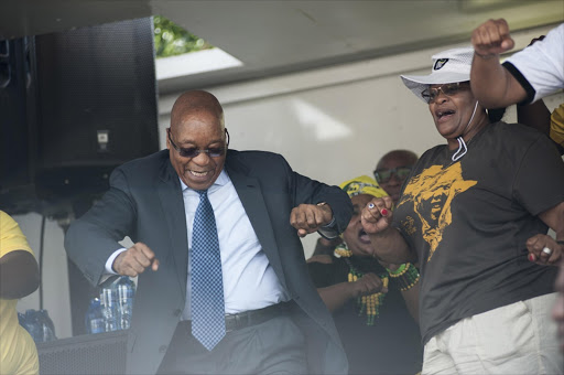 President Jacob Zuma dances on stage after he addressed the crowd as the ANC held a celebration on the famous Vilakazi Street in Soweto to prepare for the upcoming 105th anniversary of ANC. File photo