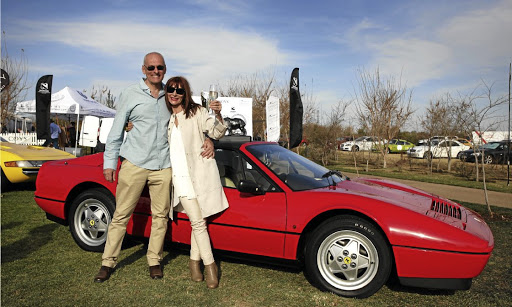 Zia and Glenn Wort in front of her winning 1989 Ferrari 328 GTS.