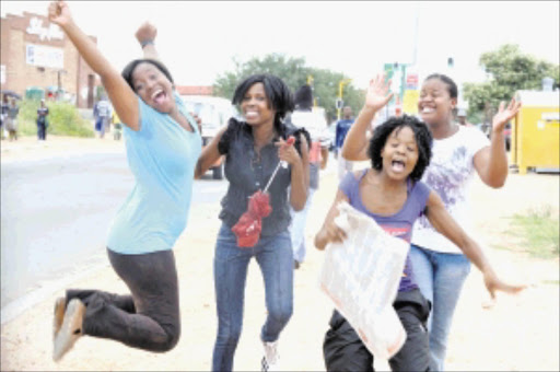 ACHIEVERS: Matriculants from ME Makgatho High School in Seshego, Limpopo, Sibongile Ramano, Johanna Kwakwa, Jacobeth Mamabolo and Mapula Setati, rejoice after discovering they had passed PHOTO: ELIJAR MUSHIANA. 07/01/2010. © Sowetan.