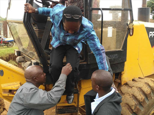 CRITICAL: Kitutu Masaba MP Timothy Bosire launches the murraming of Tombe- Nyaikuro road on Sunday.