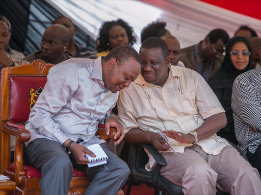 President Uhuru Kenyatta and Kwale Governor Salim Mvurya at Kikokeni trading centre, Kwale on September 3, 2016 /PSCU